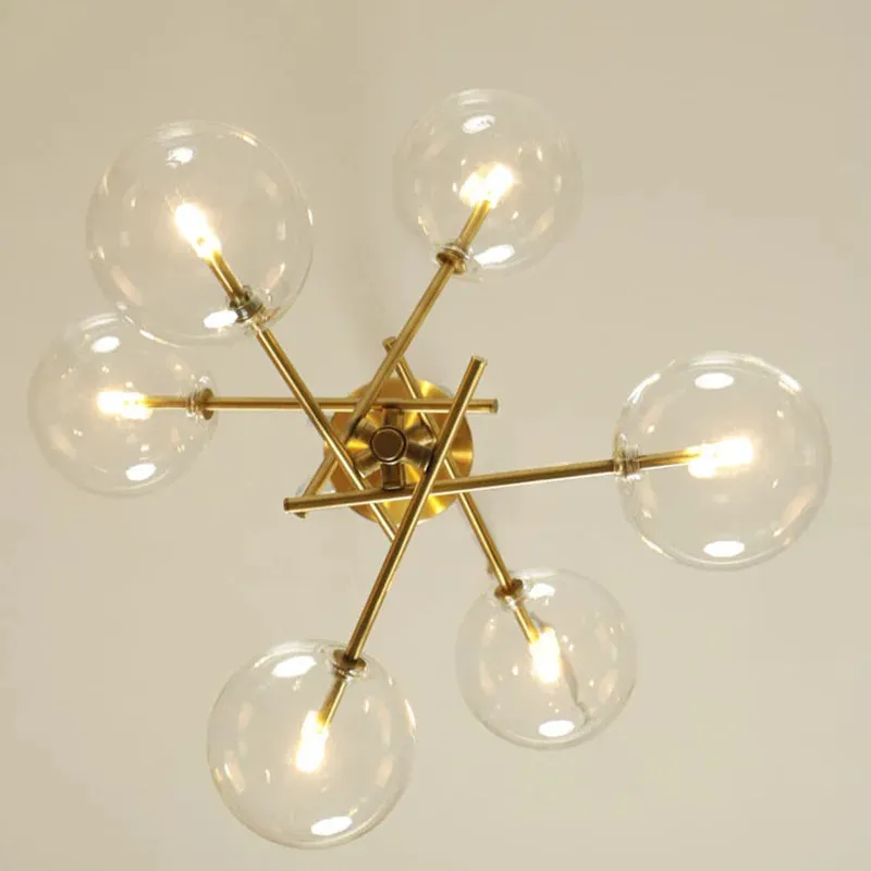 6 Light Sputnik Chandelier In Antique Brass Finish With Clear Glass Spheric Shades And Adjustable Arms