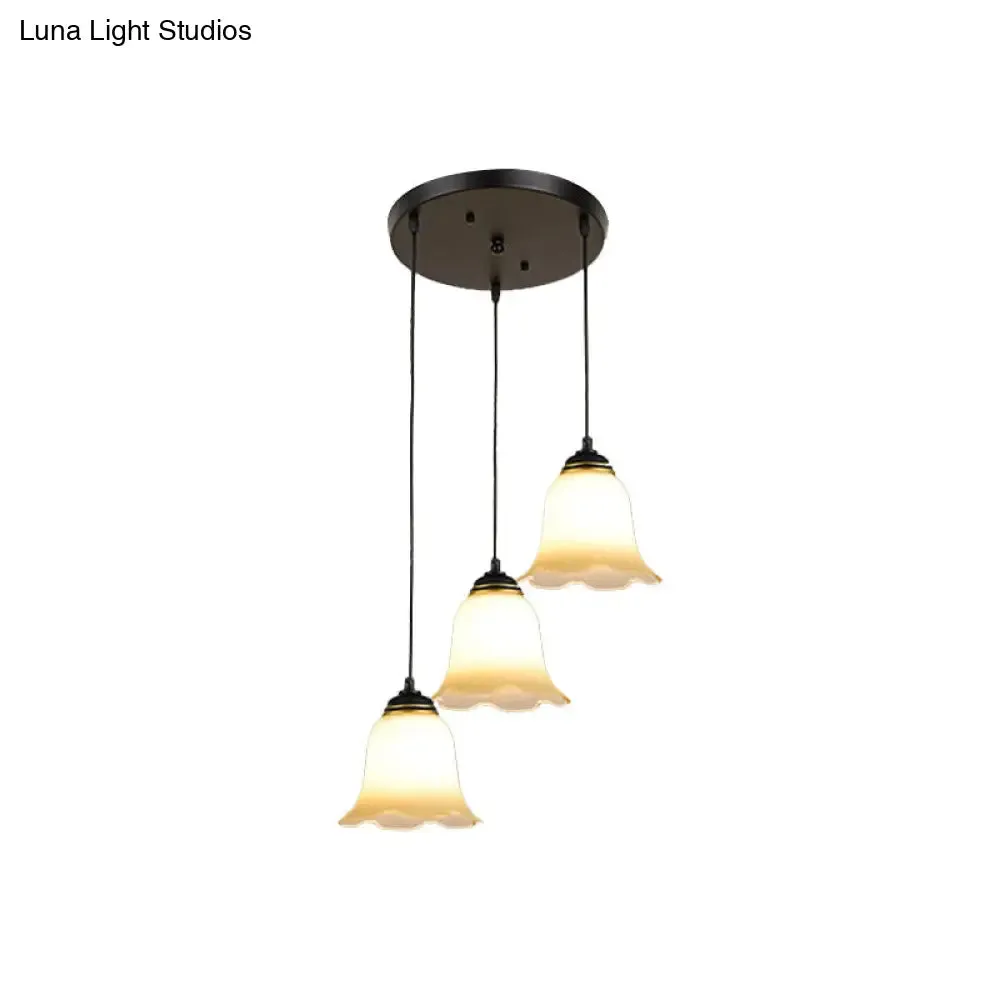 Minimalist Black Flower Stairs Pendant Light with Frosted Glass and Round Canopy
