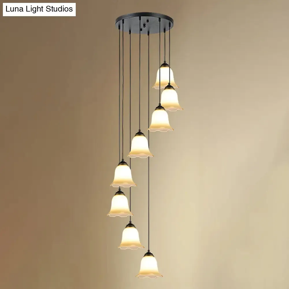 Minimalist Black Flower Stairs Pendant Light with Frosted Glass and Round Canopy