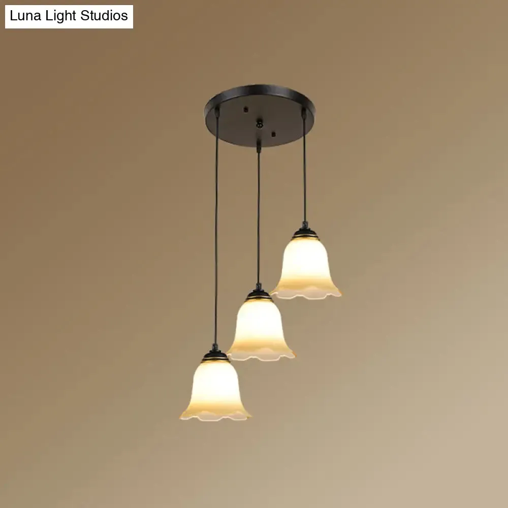 Minimalist Black Flower Stairs Pendant Light with Frosted Glass and Round Canopy