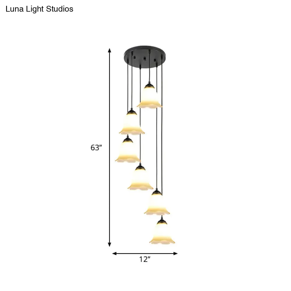 Minimalist Black Flower Stairs Pendant Light with Frosted Glass and Round Canopy