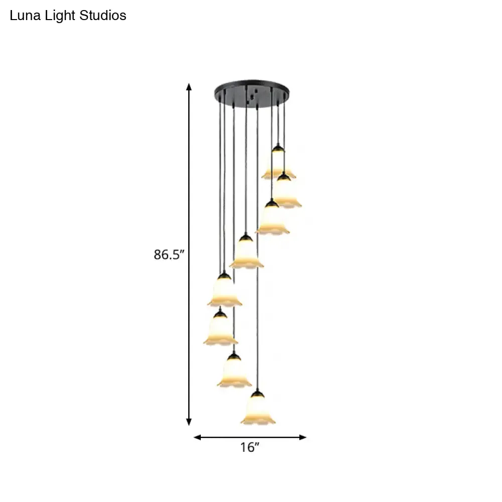 Minimalist Black Flower Stairs Pendant Light with Frosted Glass and Round Canopy