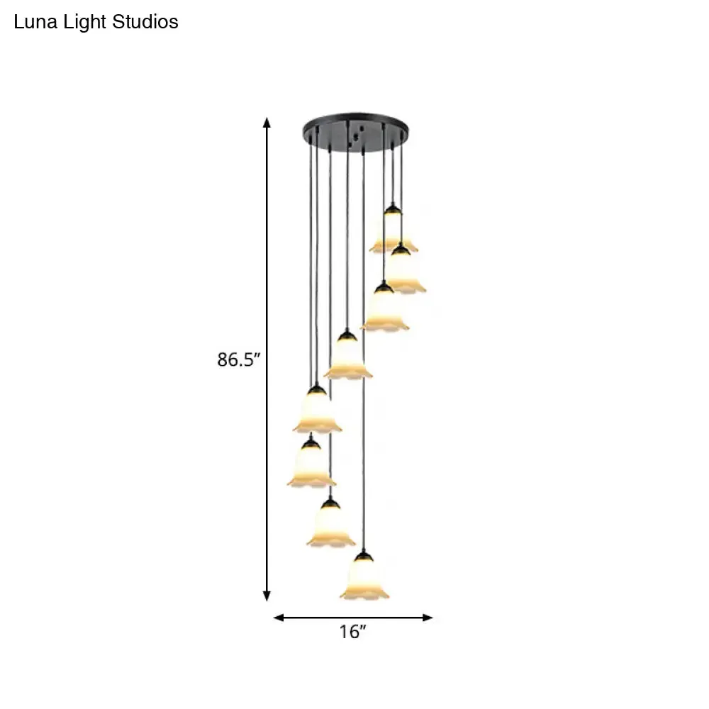 Minimalist Black Flower Stairs Pendant Light with Frosted Glass and Round Canopy